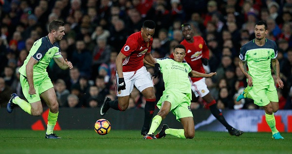 Man Utd và Liverpool chia điểm trong một trận cầu đậm tính chiến thuật của hai HLV. Ảnh: Reuters.