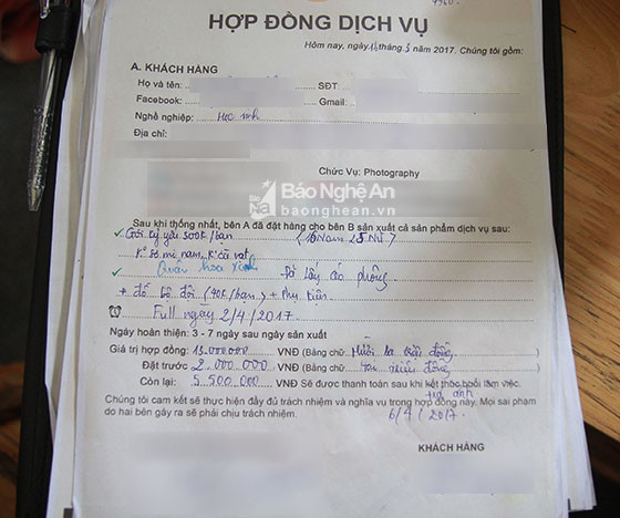 Một bản hợp đồng giữa bên chụp ảnh và đại diện lớp chụp kỷ yếu. Ảnh: PV