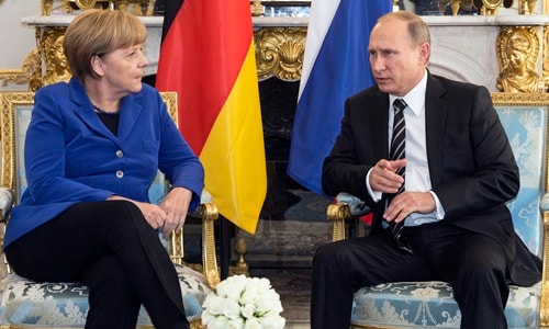 Thủ tướng Đức Angela Merkel và Tổng thống Nga Vladimir Putin. Ảnh: Reuters