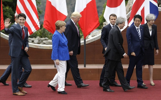 G7 đạt tiến triển về thương mại, song vẫn bất đồng về biến đổi khí hậu và mối quan hệ với Nga. Ảnh: AP