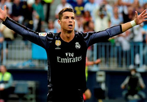 Ronaldo đã giành ba Quả Bóng Vàng trong màu áo Real, nhiều gấp ba lần so với thời chơi cho Man Utd. Ảnh: Reuters