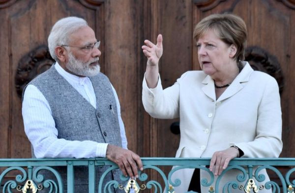 Thủ tướng Đức Angela Merkel và Thủ tướng Ấn Độ Narendra Modi. Ảnh: AFP