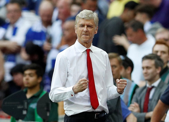 HLV Wenger sẽ ở lại Arsenal thêm 2 mùa bóng nữa. Ảnh: Reuters