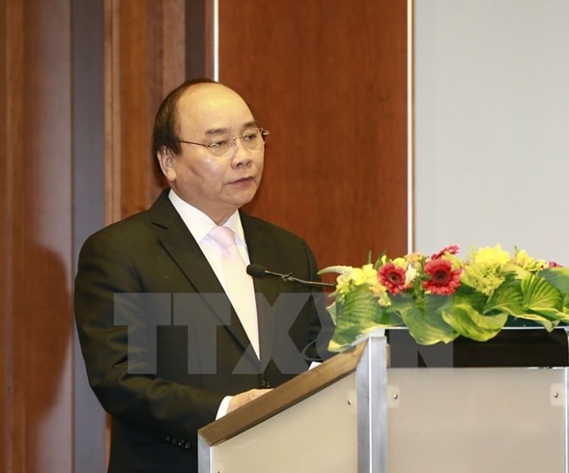 Thủ tướng Nguyễn Xuân Phúc dự Diễn đàn Doanh nghiệp Việt Nam-Đức. (Ảnh: Thống Nhất/TTXVN)