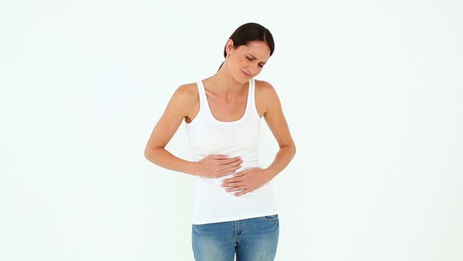 Đau bụng có thể do lạc nội mạc tử cung hoặc không dung nạp sữa... /// Shutterstock
