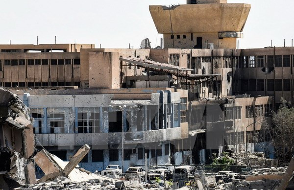 Cảnh đổ nát sau các cuộc không kích ở Syria. (Nguồn: AFP/TTXVN)