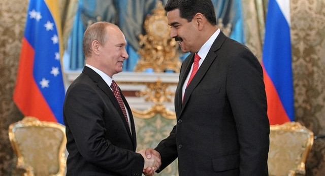 ...và Tổng thống Venezuela Maduro. Ảnh: Reuters