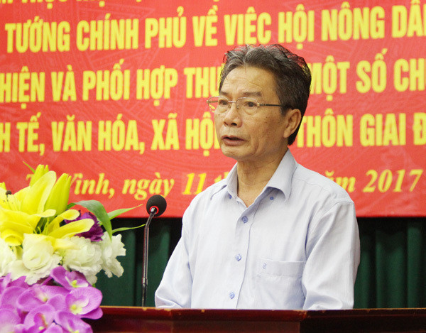 Ông Nguyễn Hữu Nhị - Chủ tịch Hội Nông dân tỉnh báo cáo kết quả 5 năm thực hiện Quyết định 673 của Thủ tướng Chính phủ. Ảnh: Mai Hoa