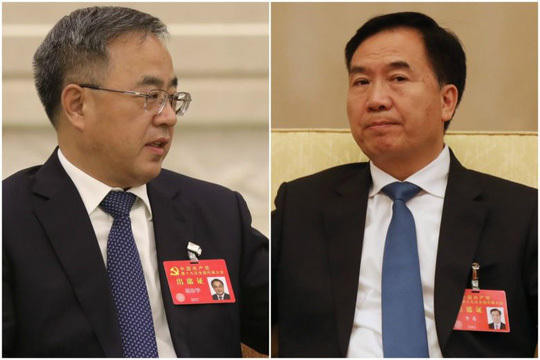 Ông Hồ Xuân Hoa (trái) và ông Lý Hy (phải). Ảnh: EPA