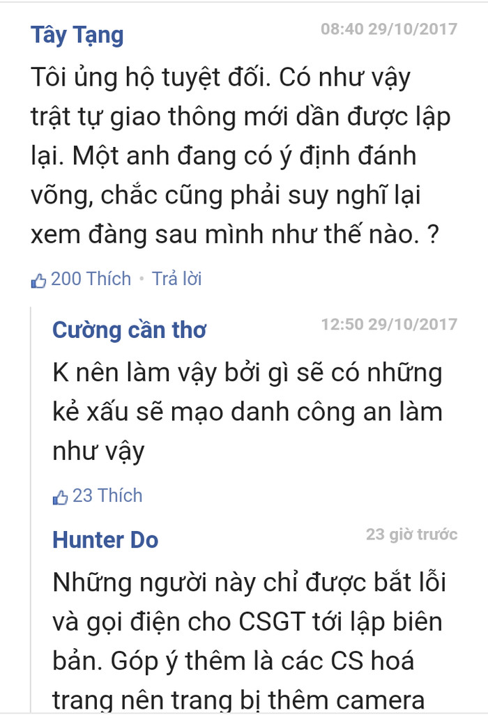 Nhiều ý kiến được đưa ra trên mạng xã hội xung quanh việc cảnh sát giao thông hóa trang phát hiện, xử lý người không đội mũ bảo hiểm. Ảnh: Phương Thảo