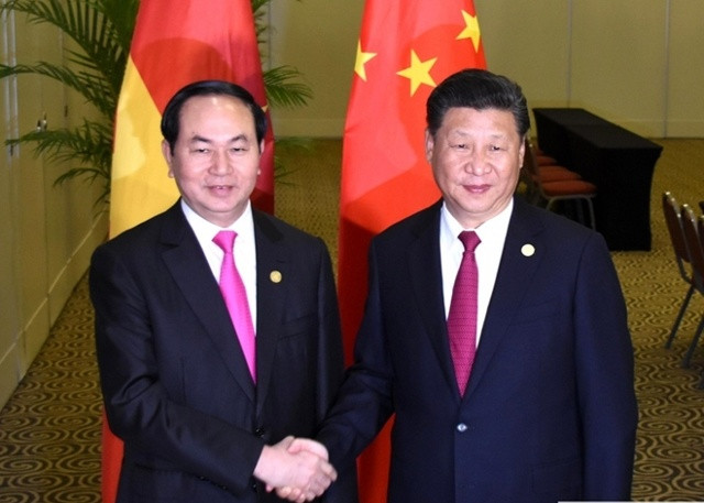 Chủ tịch nước Trần Đại Quang và Chủ tịch Trung Quốc Tập Cận Bình gặp mặt tại APEC 2016. Ảnh: Báo TG&VN