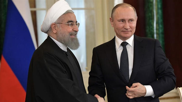 Tổng thống Nga Vladimir Putin (phải) gặp Tổng thống Hassan Rouhani hồi tháng 3/2017. Ảnh: Reuters