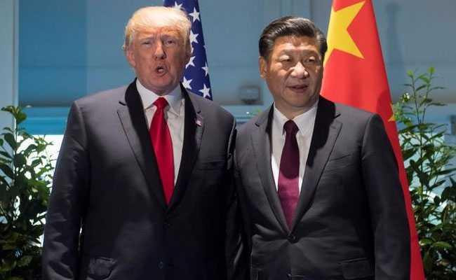 Tổng thống Trump sẽ hối thúc Chủ tịch Tập thực thi đầy đủ các nghị quyết trừng phạt Triều Tiên của LHQ. Ảnh: AP