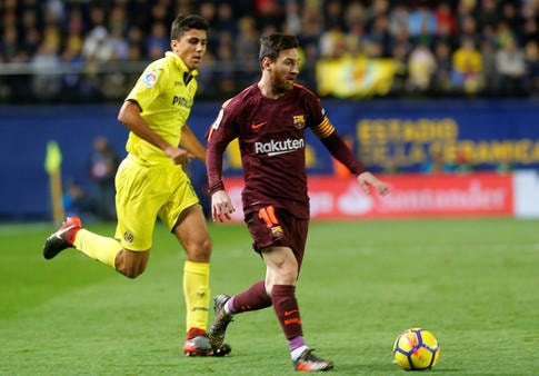 Messi góp 1 bàn trong chiến thắng 2-0 của Barcelona trên sân Villarreal. Ảnh: Reuters