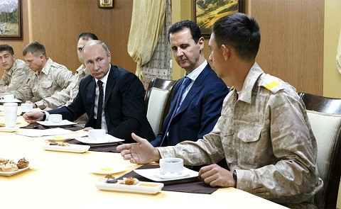 Tổng thống Putin bất ngờ ra lệnh rút quân tại Syria. Ảnh: Kremlin.ru