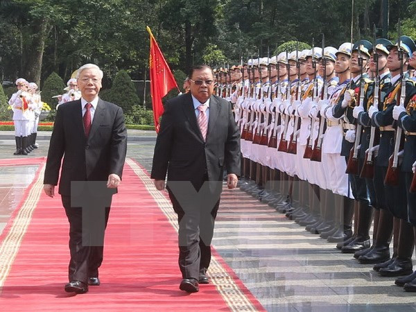 Nhận lời mời của Tổng Bí thư Nguyễn Phú Trọng và Chủ tịch nước Trần Đại Quang, Tổng Bí thư, Chủ tịch nước Lào Bounnhang Vorachith bắt đầu thăm hữu nghị chính thức Việt Nam từ ngày 19-21/12. 