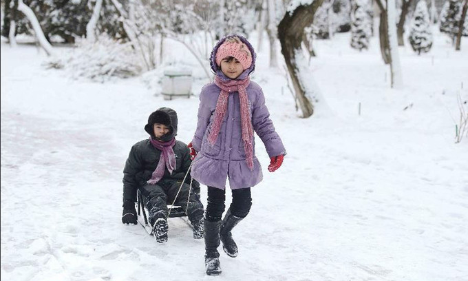 Người dân Uzbekistan đã quen với mùa đông giá lạnh. Ảnh: Xinhua.