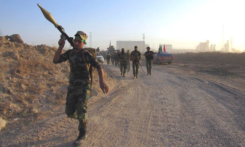 Dân quân Iraq trong một chiến dịch tấn công IS. Ảnh: IraqiNews.