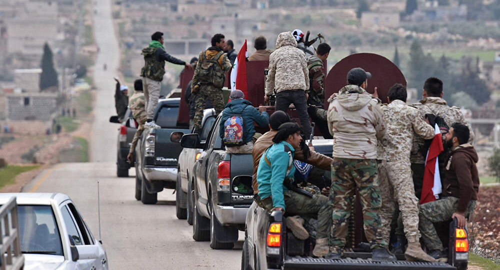 Bức ảnh chụp ngày 20/2/2018 cho thấy đoàn xe của quân Syria đang tiến vào biên giới phía bắc Afrin