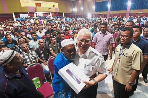  Chương trình BR1M là một trong những chính sách hiếm hoi của chính phủ do Thủ tướng Najib đứng đầu được người dân Malaysia ủng hộ. Ảnh: The Star Online. 