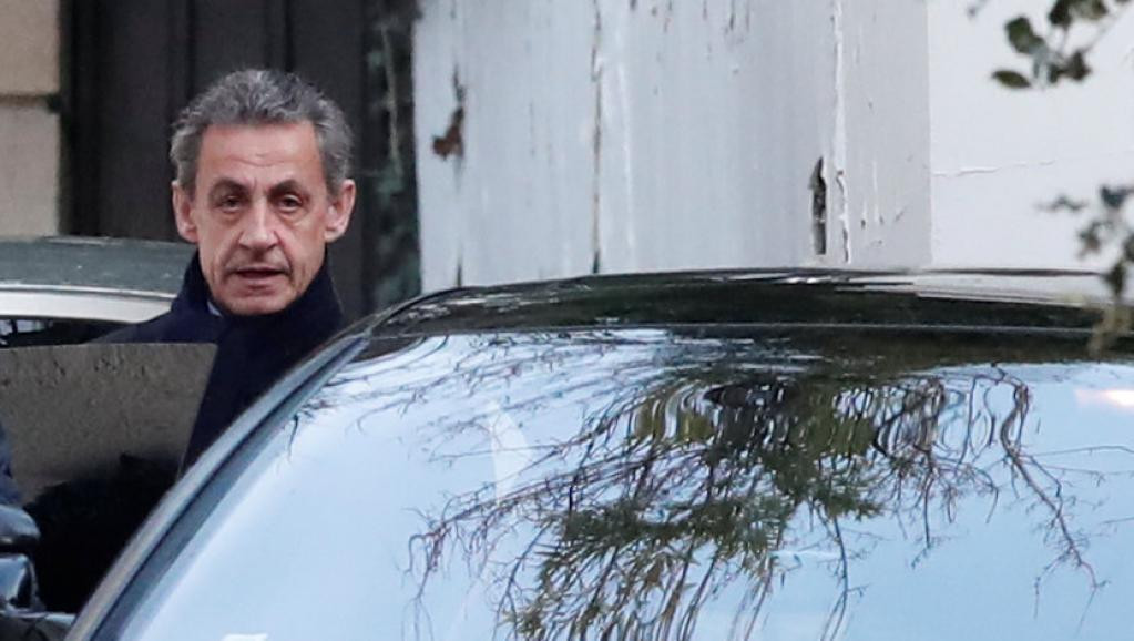 Cựu tổng thống Pháp Nicolas Sarkozy rời trụ sở cơ quan điều tra chống tham nhũng ở Nanterre. Ảnh ngày 21/03/2018.