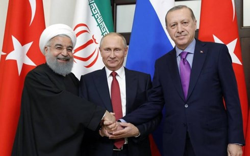 Lãnh đạo Nga-Iran-Thổ Nhĩ Kỳ thể hiện tình đoàn kết trong vấn đề Syria. Ảnh: Reuters