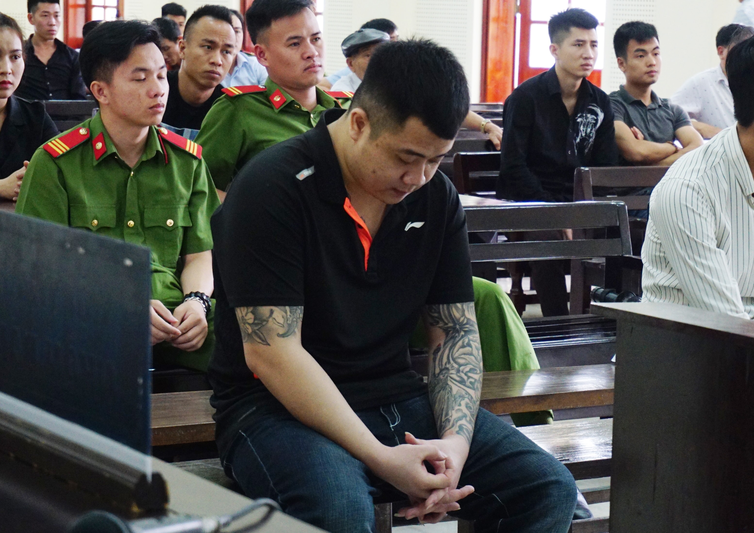 Trần Anh Tuấn tại tòa. Ảnh: Như Bình