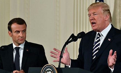 Tổng thống Mỹ Donald Trump (phải) và Tổng thống Pháp Emmanuel Macron tổ chức họp báo tại Nhà Trắng ngày 24/4. Ảnh: AFP. 