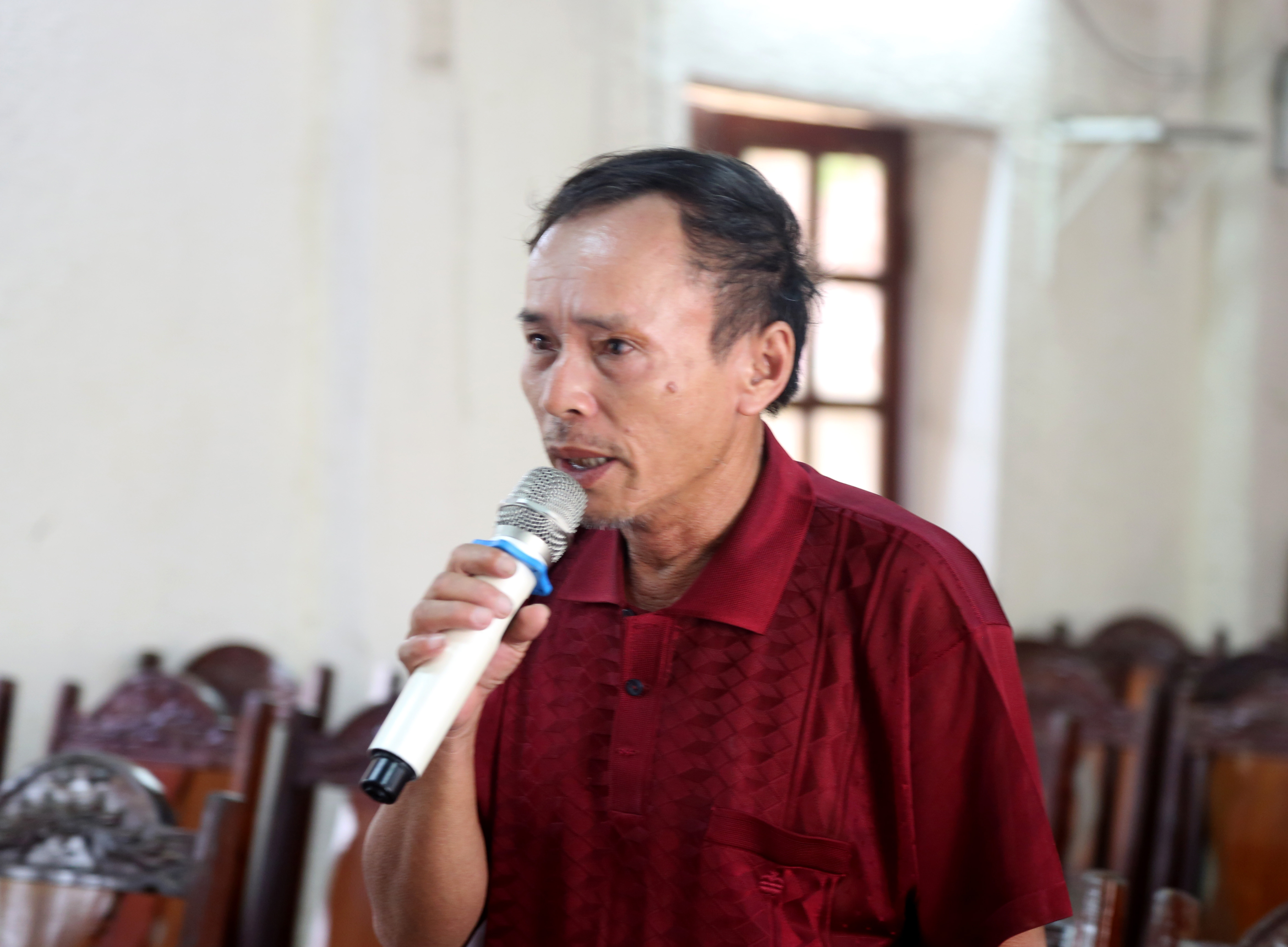 Ông Nguyễn Đình Thành – Xóm trưởng xóm Nam Phúc Long phát biểu tại cuộc họp. Ảnh: Hoàng Hảo