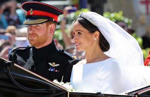 Vợ chồng Hoàng tử Harry trong đám cưới ngày 19/5. Ảnh: AFP