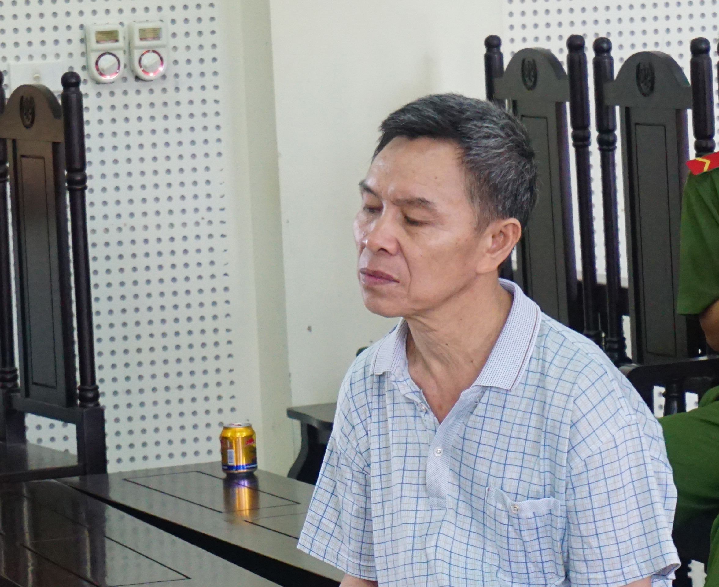 Bị cáo Nguyễn Hữu Sơn tại phiên tòa. Ảnh: Như Bình