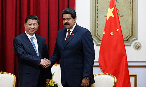 Chủ tịch Trung Quốc Tập Cận Bình (trái) và Tổng thống Venezuela Nicolas Maduro tại Bắc Kinh ngày 14/9. Ảnh: Reuters.