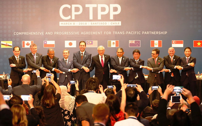Đại diện các nước thành viên CPTPP chụp ảnh lưu niệm tại Chile hồi tháng 3 /// Reuters