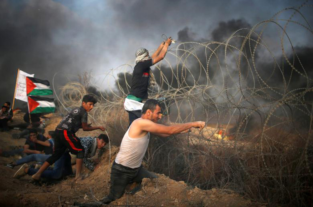 biểu tình kêu gọi dỡ bỏ phong tỏa Israel trên Gaza và yêu cầu quyền trở về quê hương của họ