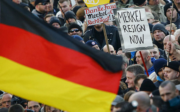 Chính sách mở cử với người tị nạn của bà Merkel gây chia rẽ trong xã hội Đức. Ảnh Getty