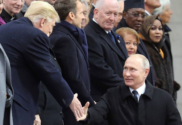 nu cuoi am ap trump danh cho putin khi cham tran o paris hinh anh 2