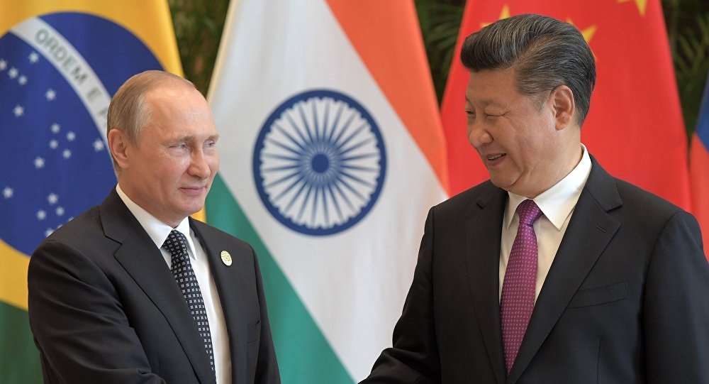Tổng thống Nga Vladimir Putin và Chủ tịch Trung Quốc Tập Cận Bình. Ảnh: Sputnik 