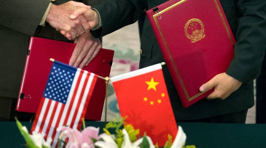 Đàm phán cấp cao về thương mại giữa Mỹ và Trung Quốc sẽ diễn ra ngày 14 và 15/2. Ảnh AFP 