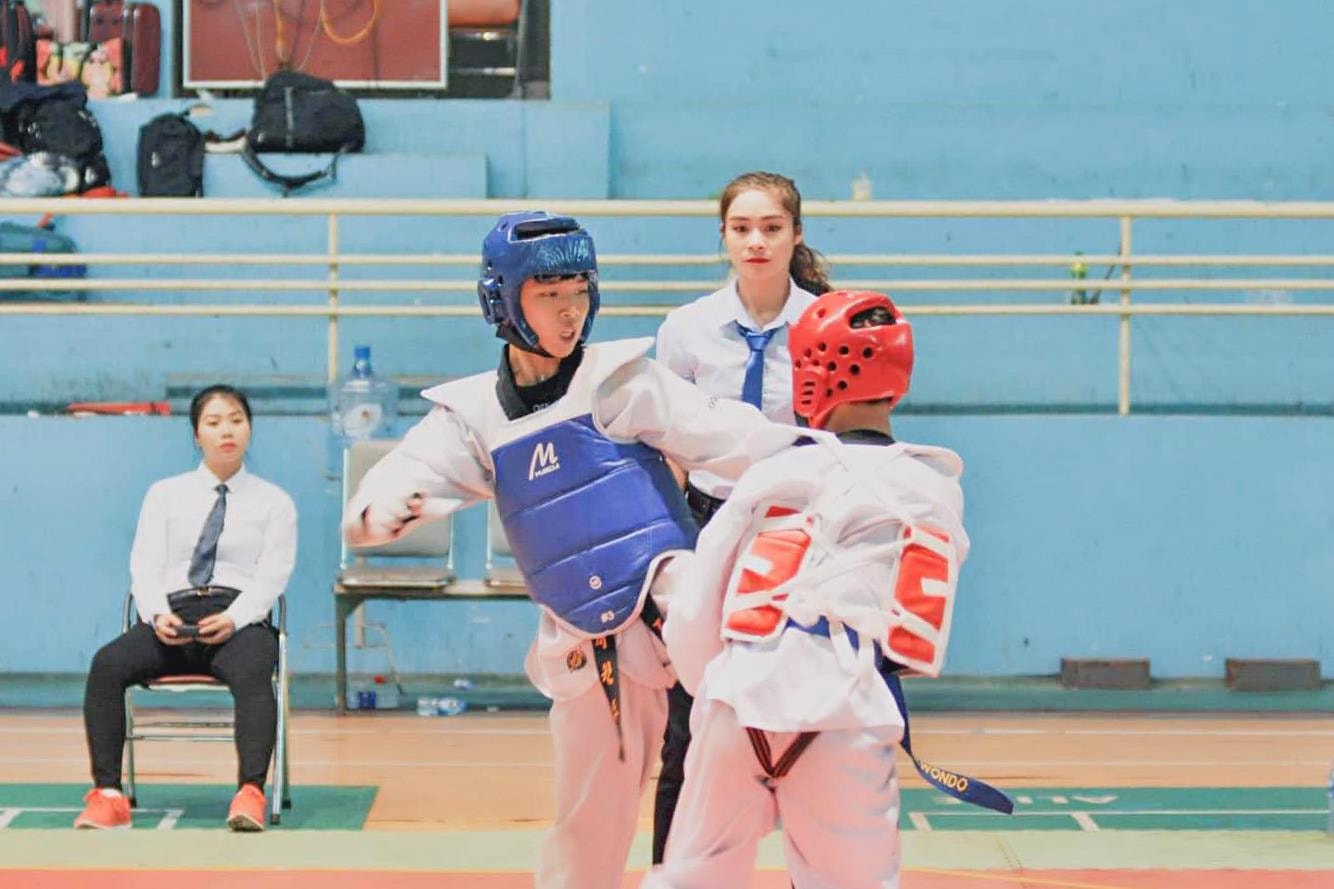 HLV, trọng tài trẻ Cao Thị Quang của Taekwondo Nghệ An. Ảnh: NVCC