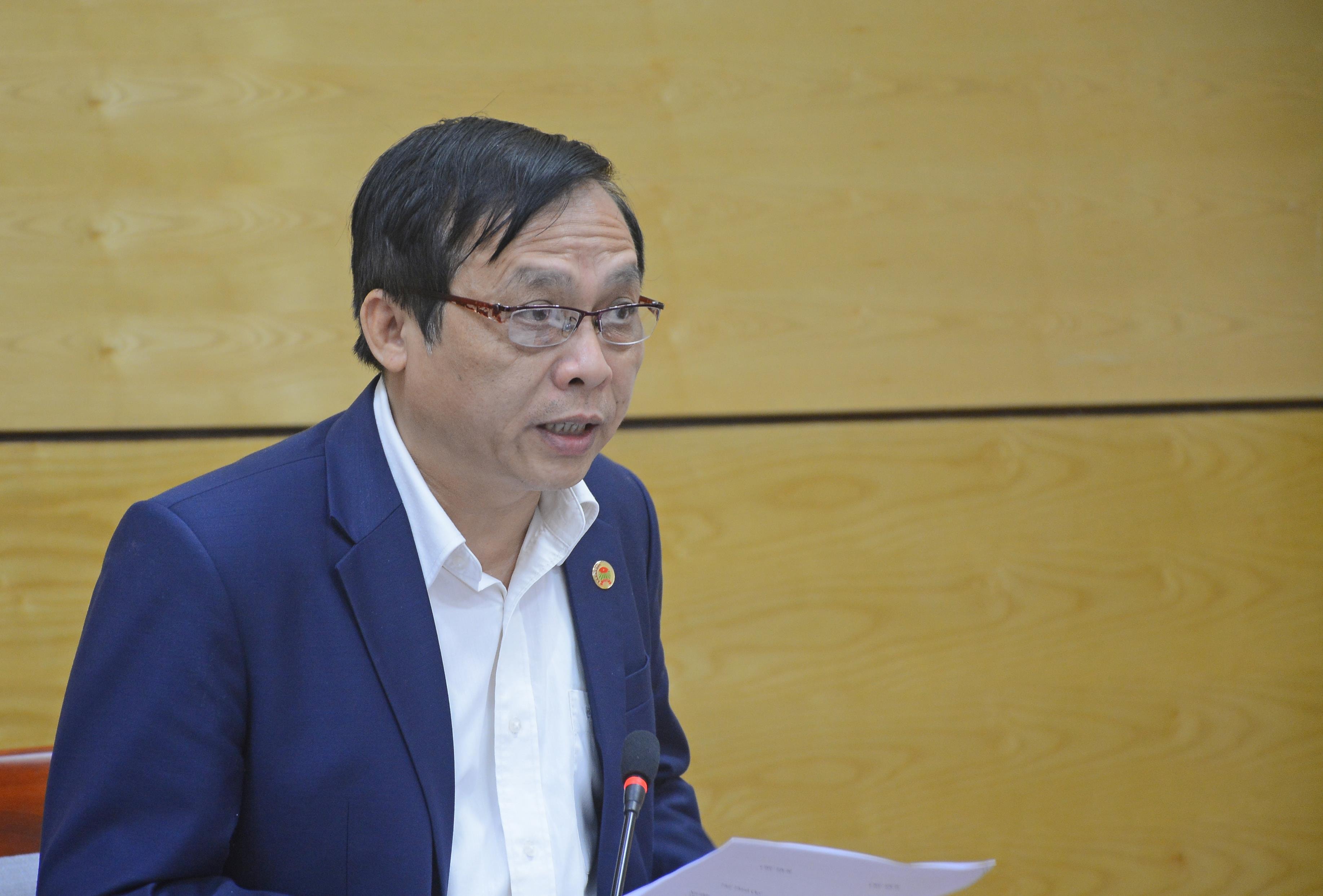Chủ tịch Hội Nông dân tỉnh Nguyễn Quang Tùng báo cáo kết quả thực hiện Chương trình phối hợp công tác giữa UBND tỉnh và Hội Nông dân tỉnh năm 2018. Ảnh: TG