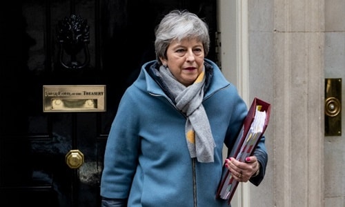 Thủ tướng Anh Theresa May rời số 10 phố Downing ngày 20/3. Ảnh: AFP.