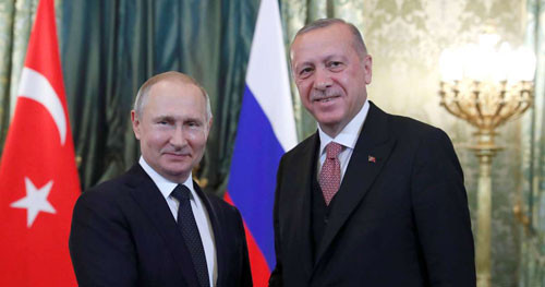 Tổng thống Nga Putin (trái) và người đồng cấp Thổ Nhĩ Kỳ Erdogan gặp nhau tại Điện Kremlin ngày 8/4. Ảnh: AP.