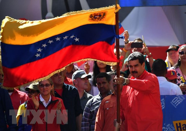Tổng thống Venezuela Nicolas Maduro tham gia cuộc tuần hành ủng hộ Chính phủ ở Caracas ngày 23-2-2019. (Ảnh: THX/TTXVN)