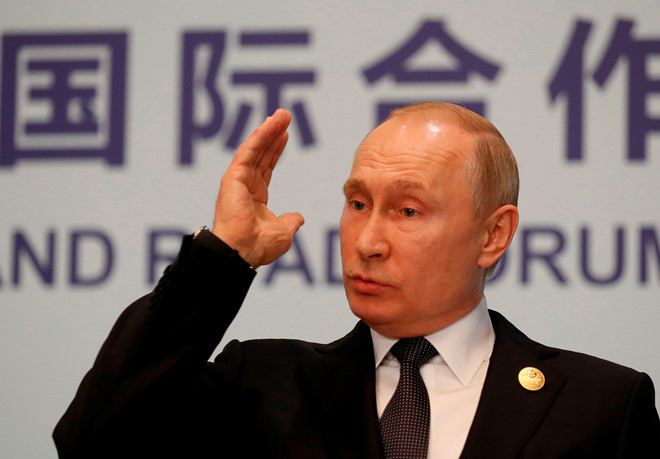 Tổng thống Vladimir Putin trong cuộc họp báo ở Bắc Kinh ngày 27.4 /// AFP