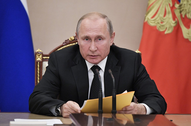 Tổng thống Nga Vladimir Putin chủ trì cuộc họp với các thành viên Hội đồng an ninh ở Moscow ngày 23.8 /// Reuters