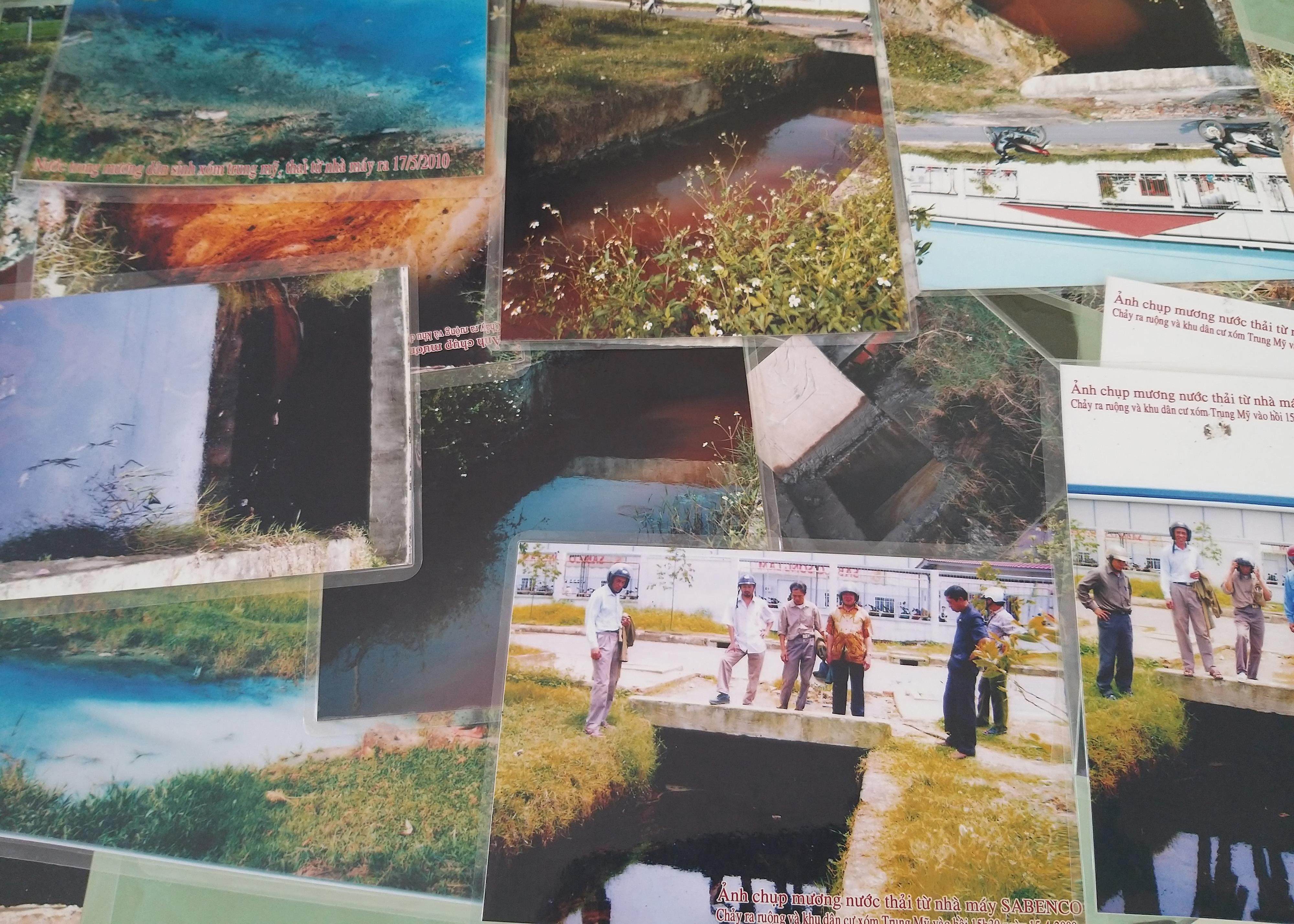 Những bức ảnh mà UBND xã Hưng Đông còn lưu trữ, chứng minh Công ty CP bao bì Sabeco Sông Lam xả thải gây ô nhiễm môi trường. Ảnh: Phạm Bằng