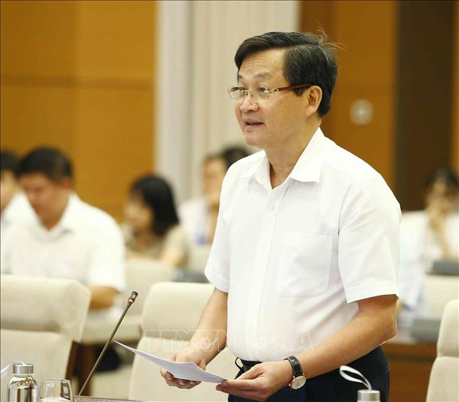 Tổng Thanh tra Chính phủ Lê Minh Khái trình  bày báo cáo. Ảnh: TTXVN