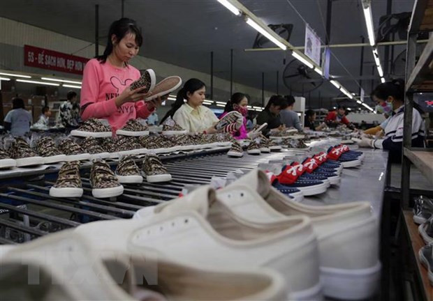 Dây chuyền sản xuất giày dép của Việt Nam. Ảnh: TTXVN