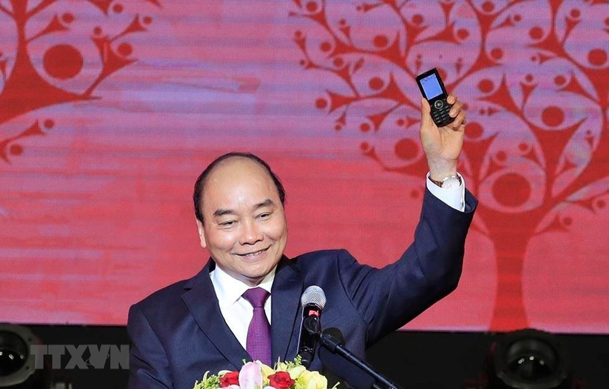 Thủ tướng Nguyễn Xuân Phúc nhắn tin ủng hộ Tết vì người nghèo và nạn nhân chất độc da cam. Ảnh: Thống Nhất/TTXVN.