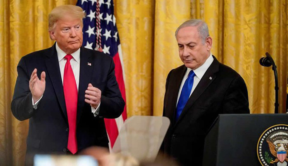 Tổng thống Mỹ Donald Trump (trái) và Thủ tướng Israel Benjamin Netanyahu trong lễ công bố “Kế hoạch Hòa bình Trung Đông” tại Nhà Trắng hôm 28/1. Ảnh: Reuters